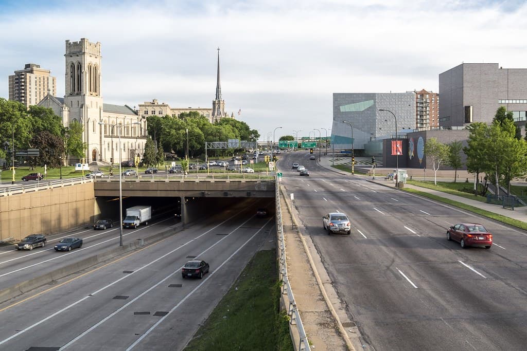 A bus in a dedicated lane on a reopened Hennepin Avenue